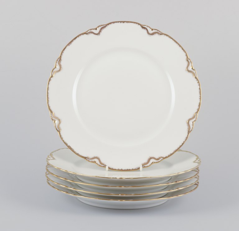 Et sæt på fem "Haviland" middagstallerkener af porcelæn.