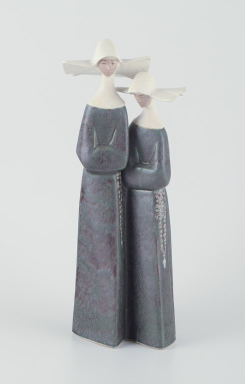 Lladró, Spain.Large ceramic figurine of two nuns.