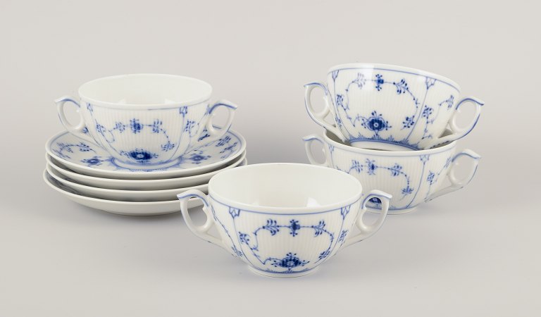 Royal Copenhagen Blue Fluted Plain.A set of four bouillon cups with matching saucers.