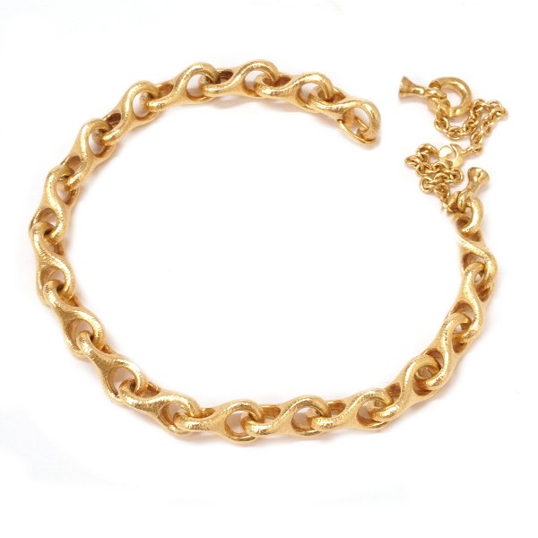 Ole Lynggaard 8-tals armlænke i 14kt guld. Ledstr. 7x13mm. L: 18cm (kraftige led i kæde)