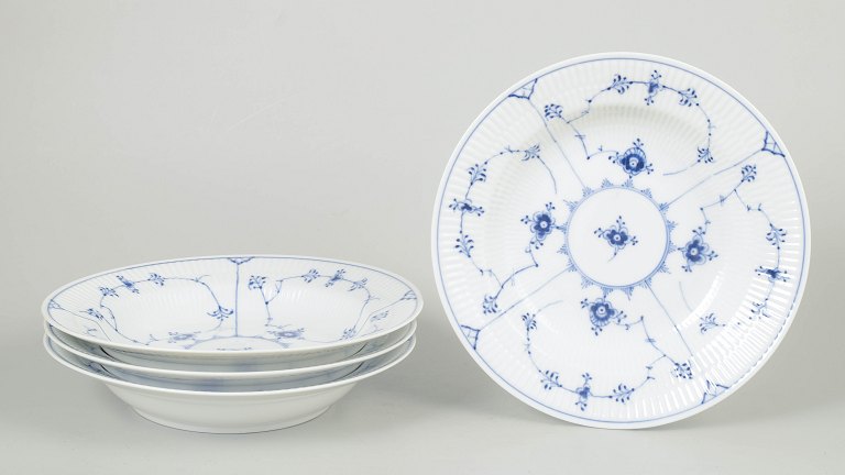 Royal Copenhagen Blue Fluted Plain, set of four deep plates.