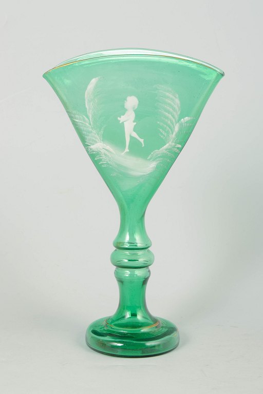 Mary Gregory style green glass goblet, hand-enamelled figural motif.