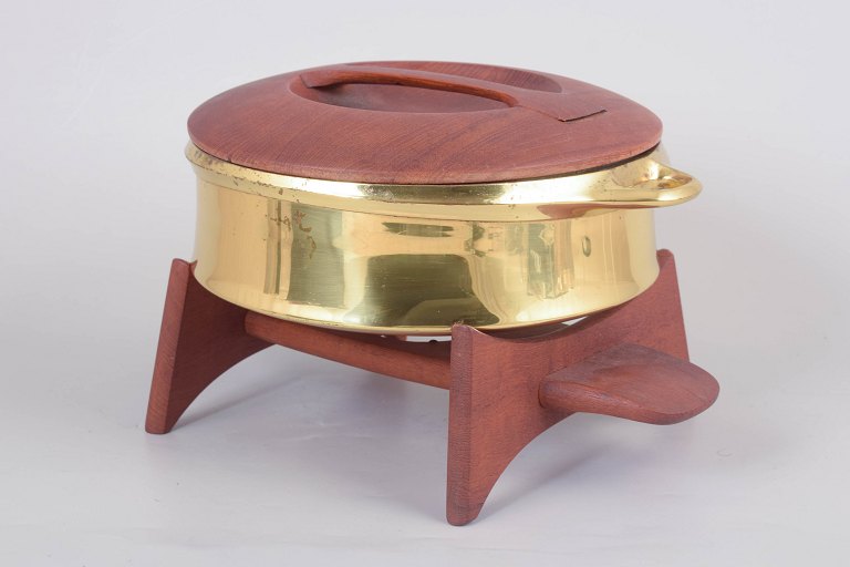 Jens H. Quistgaard for Dansk Designs, brass casserole with exotic wood lid and stand.