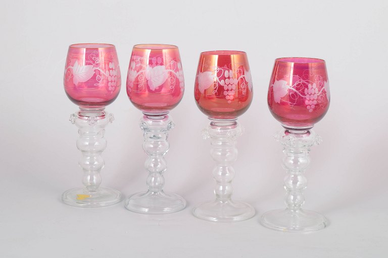 Set of four Bohemian red wine glasses.