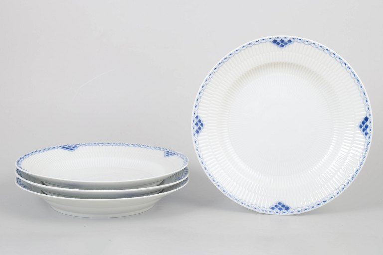 Set of four Royal Copenhagen Princess deep plates.