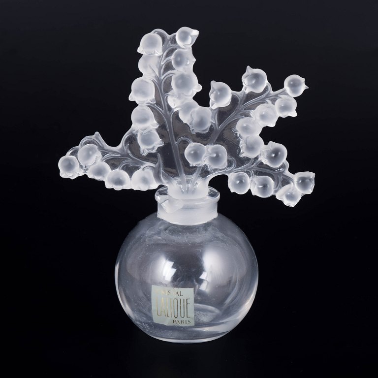 Lalique, perfume bottle with lily of the valley motif.
