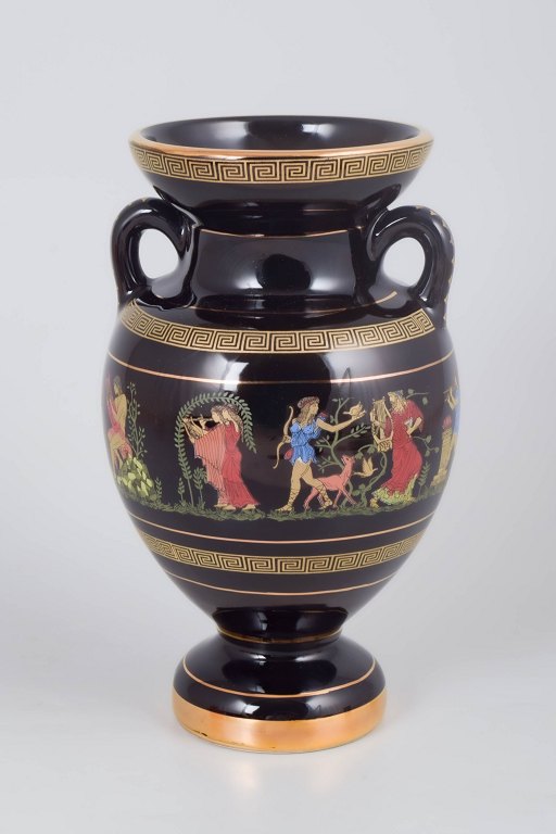 Greek porcelain vase with 24 karat gold decoration.