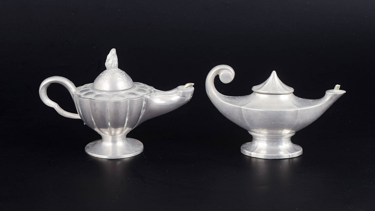 Just Andersen, pair of pewter oil lamps.